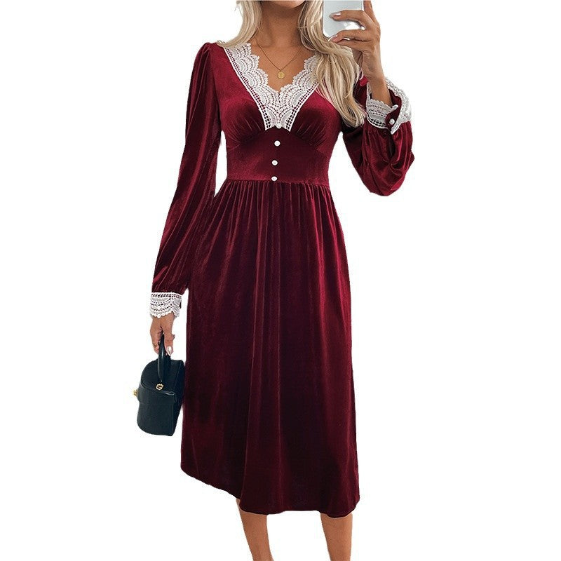 Women's velvet midi dress with lace decoration, V neckline and fitted empire silhouette.