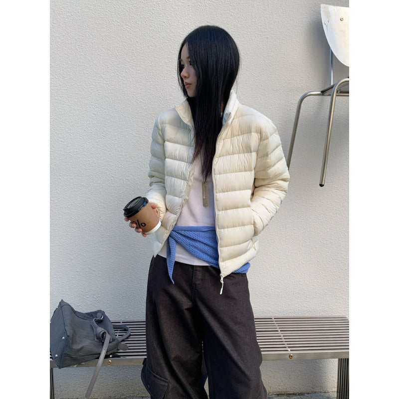 Women's lightly padded quilted jacket with high collar Chichicherry