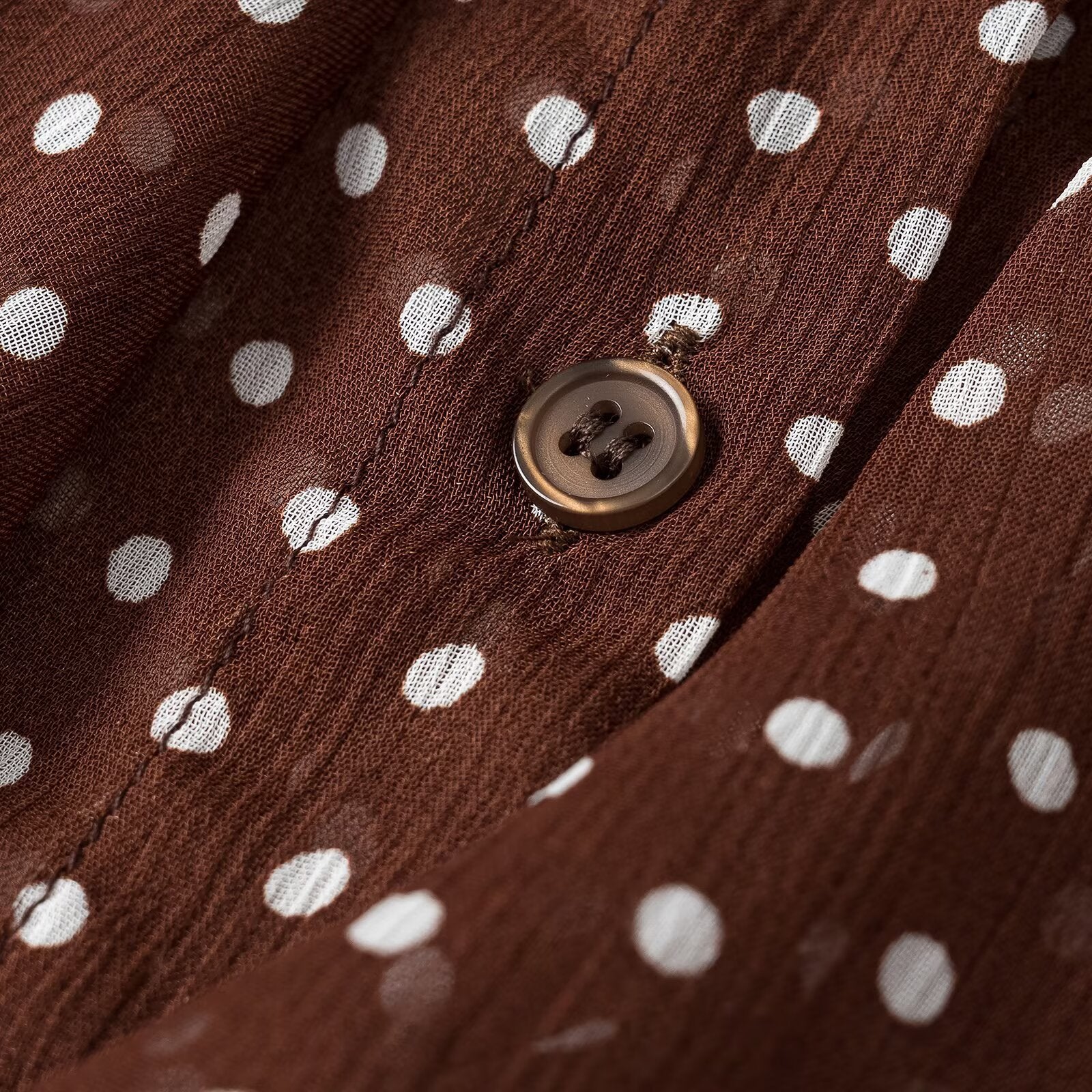 Women's semi-transparent chiffon blouse with dots, ruffle details and bow collar Chichicherry