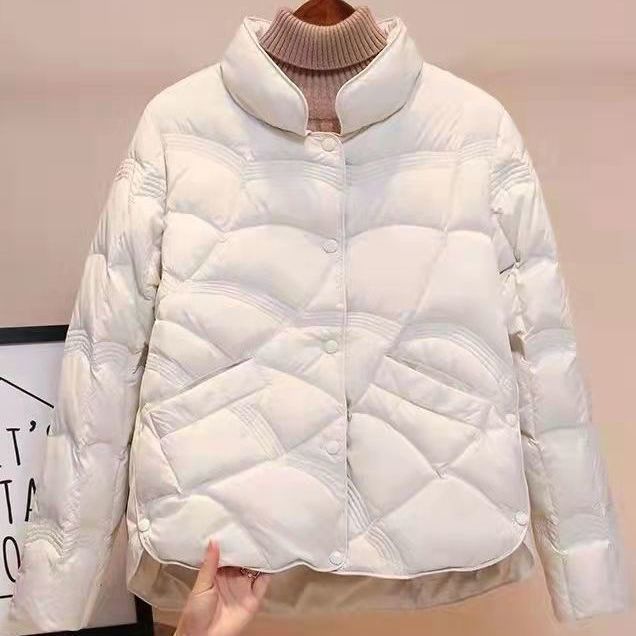 Women's quilted thermal jacket with high collar and decorative wave quilting Chichicherry