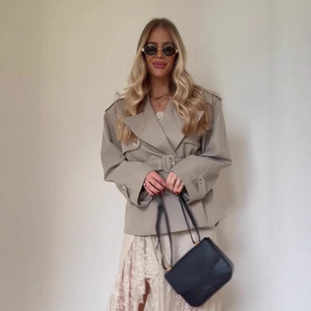 Women's short trench-style jacket with a tailored tie belt and wide sleeves Chichicherry