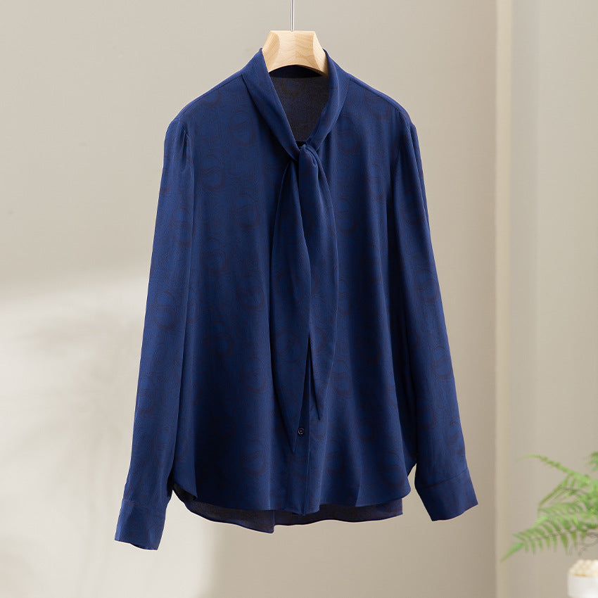 Women's blouse with bow collar and subtle jacquard texture Chichicherry