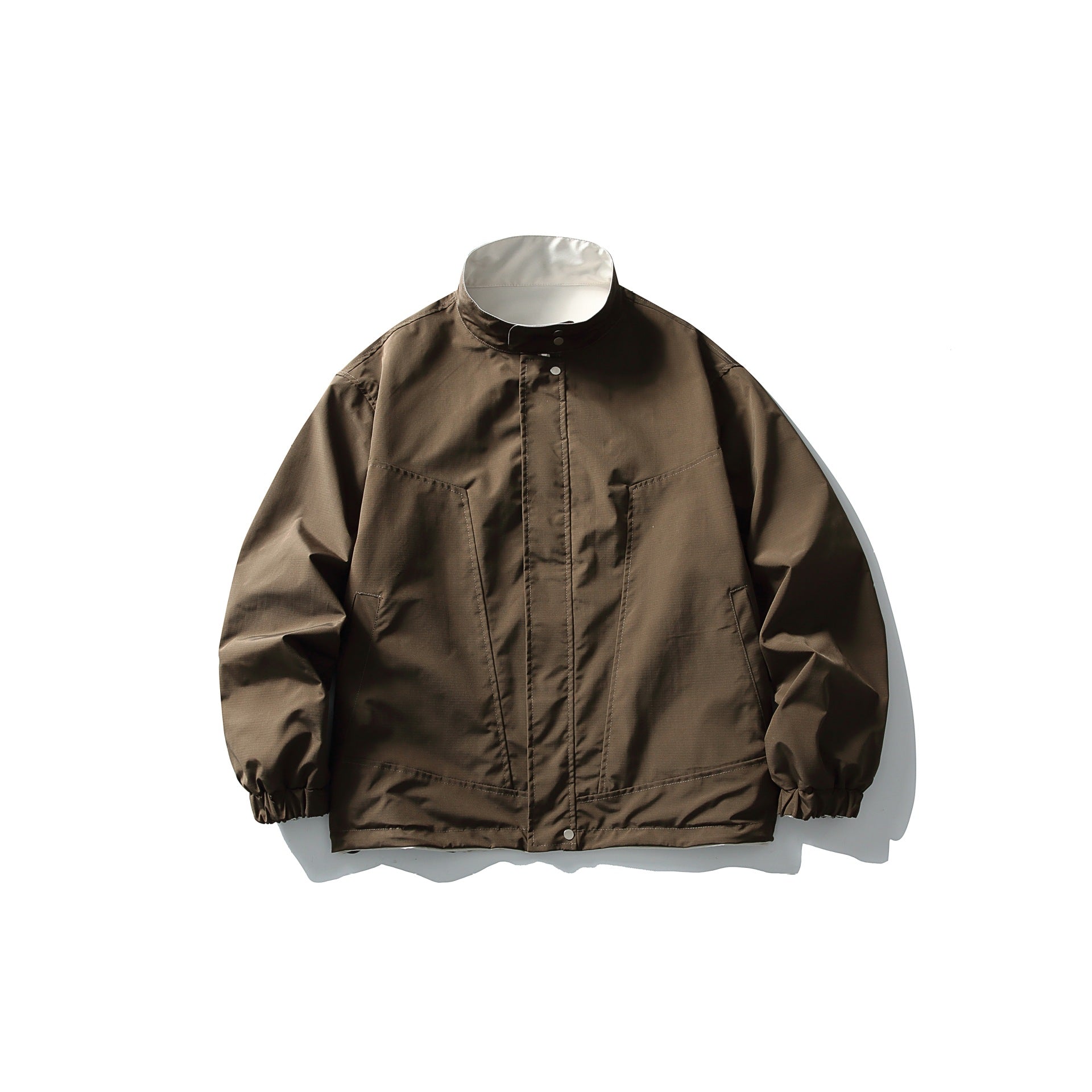 Unisex Lightweight wind and water-repellent oversized boxy jacket with stand-up collar and elastic hem Chichicherry