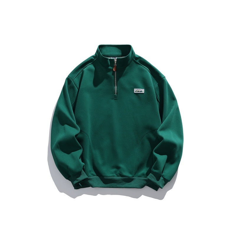Unisex half-zip sweatshirt with stand-up collar, raglan sleeves, and minimalist chest patch Chichicherry