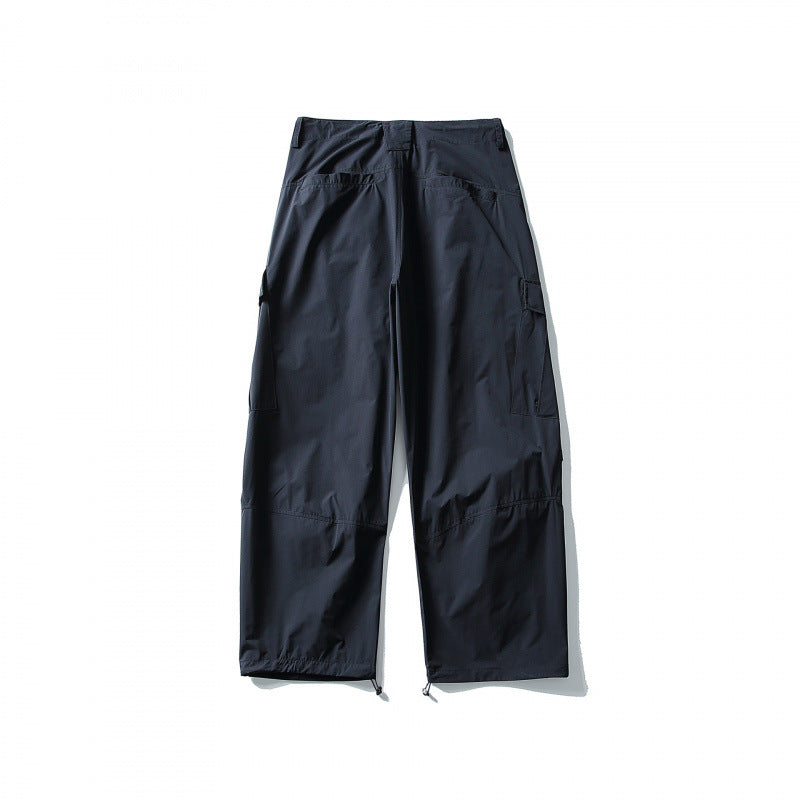 Men's loose technical cargo pants with drawstring waistband and adjustable leg closures Chichicherry
