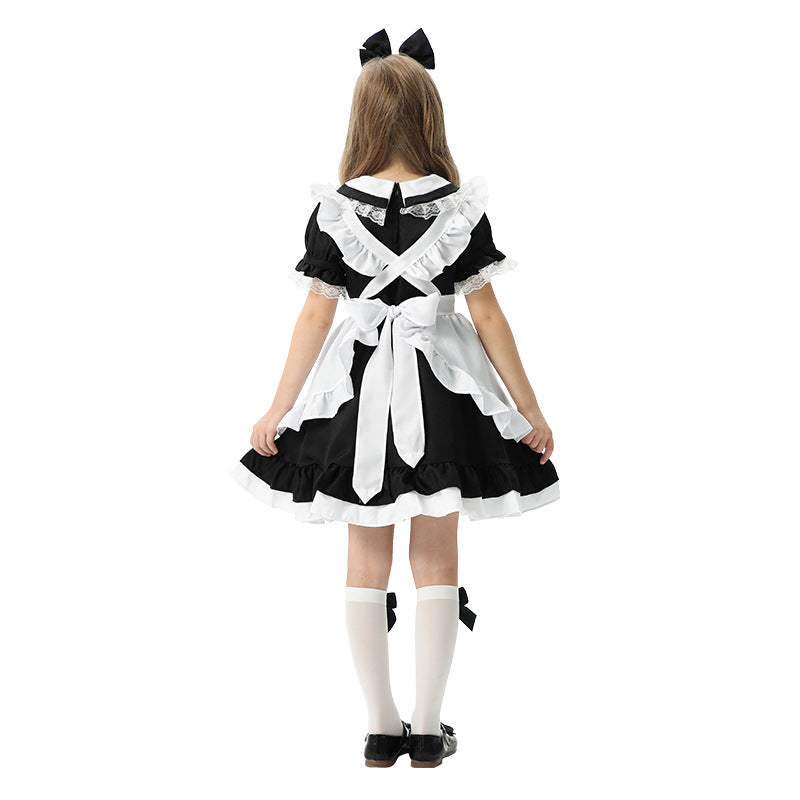 Girl's playful maid dress with ruffle details Chichicherry