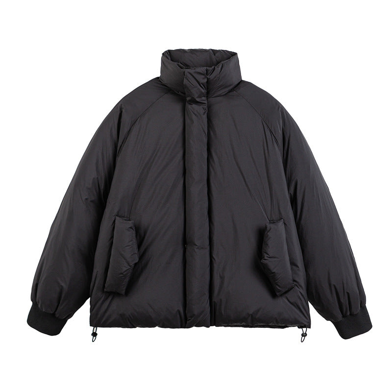 Unisex Boxy-padded short jacket with high stand-up collar, raglan sleeves and drawstring hem Chichicherry