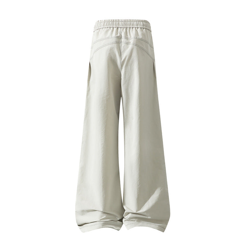 Men's Wide Cargo Pants with Drawstring Waistband, Utility Seams and Zip Pockets Chichicherry