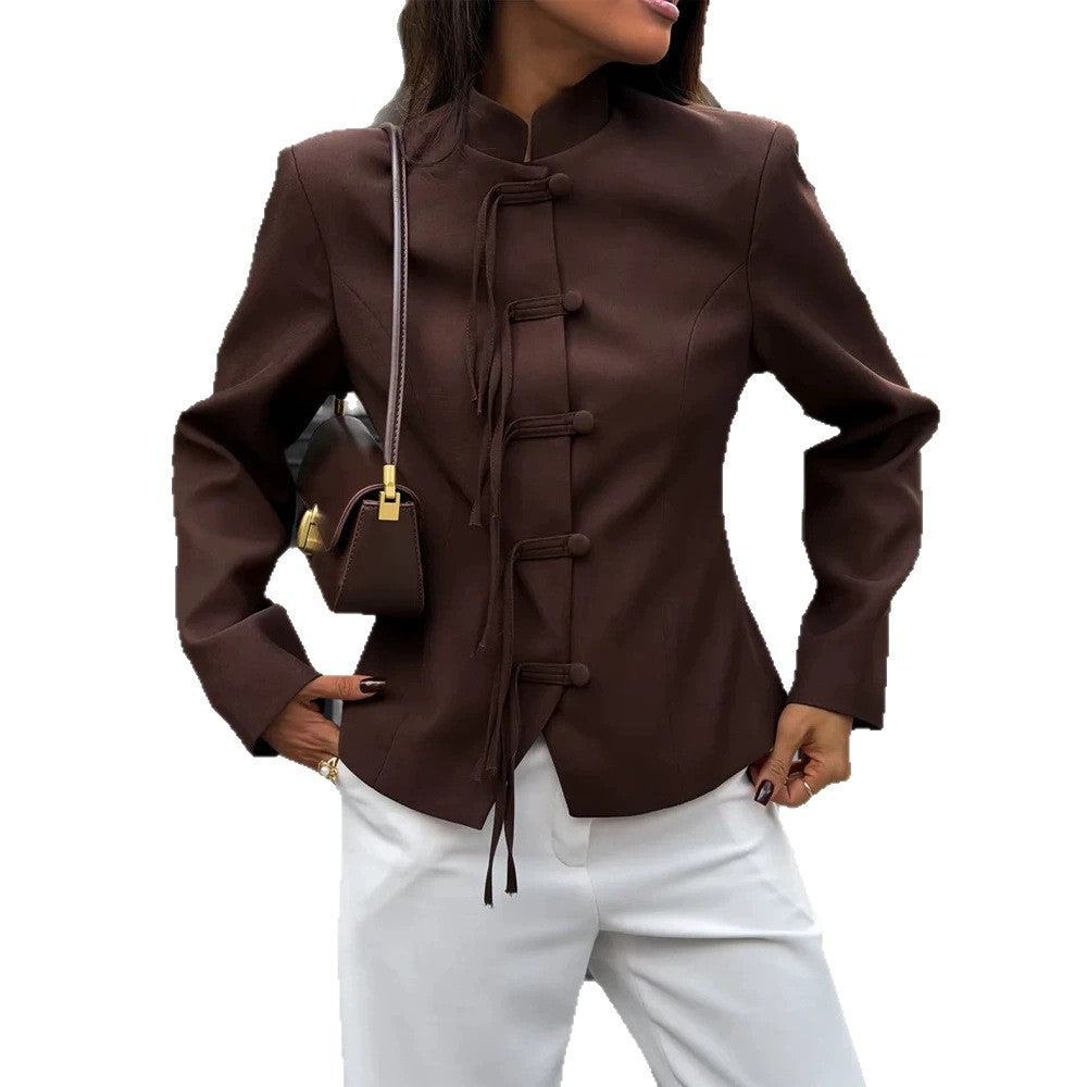 Women's fitted jacket with stand-up collar, Chinese knot fastenings, and slightly cropped cut.