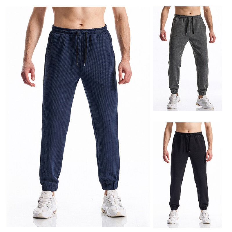 Men's Textured Jogging Pants with Elastic Waistband, Drawstring, and Cuffed Hem Chichicherry