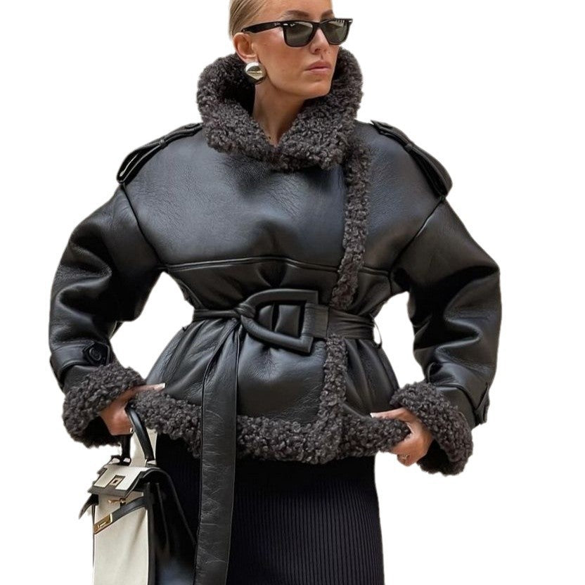 Women Short Flight Jacket Made of Faux Leather with Teddy Fur Collar and Waist Belt Chichicherry