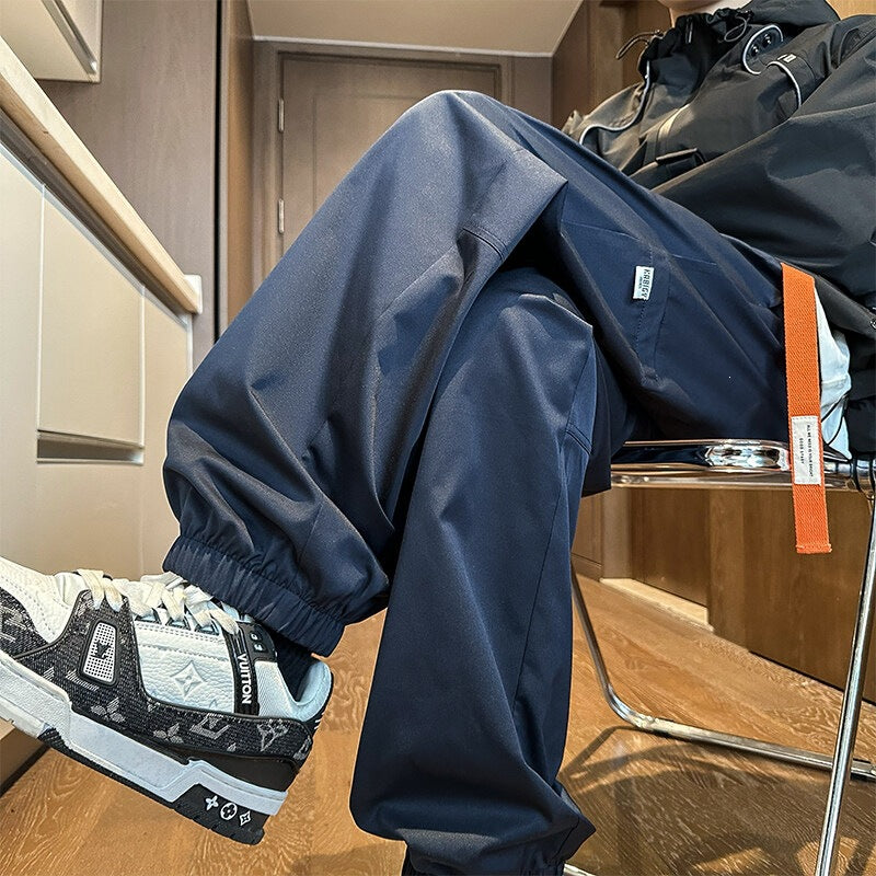 Men's Water-Repellent Tech Jogging Pants with Elastic Hem, Drawstring, and Durable Seams Chichicherry