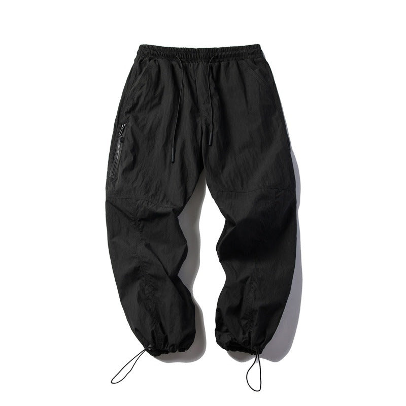 Unisex Technical Cargo Pants in Baggy Cut with Drawstring Waist and Adjustable Leg Closures Chichicherry