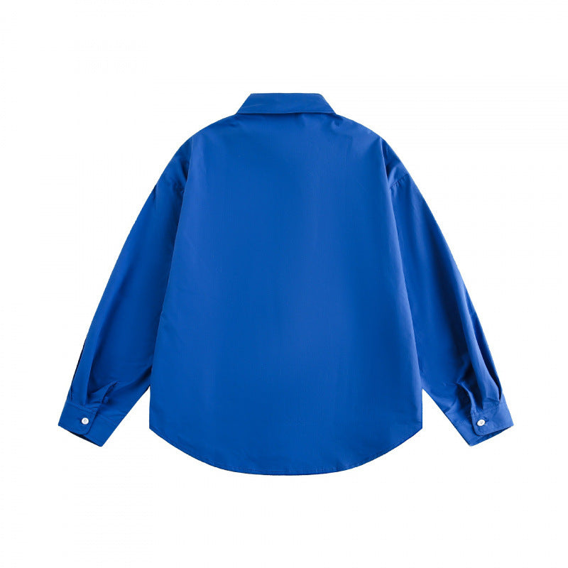 Unisex Loose-fitting oversized shirt made of cotton blend with Kent collar, chest pocket, and rounded hem Chichicherry
