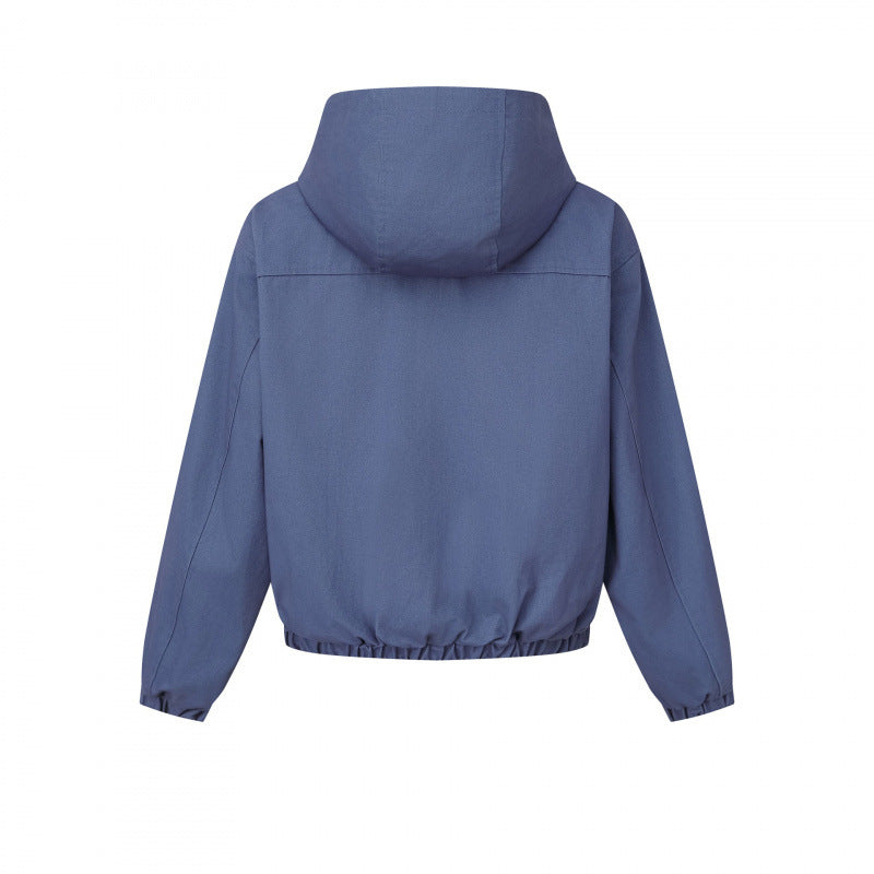 Ladies short cut hooded blouson jacket with textured fabric, patch pockets, and elastic hem Chichicherry