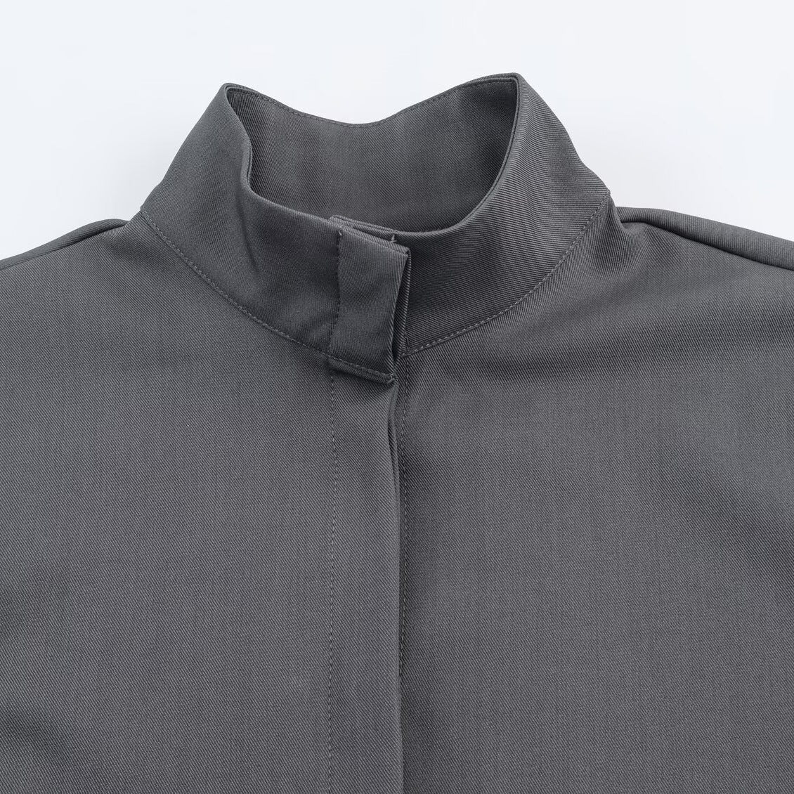 Women's loose-fitting tunic blouse with concealed button placket and stand-up collar Chichicherry