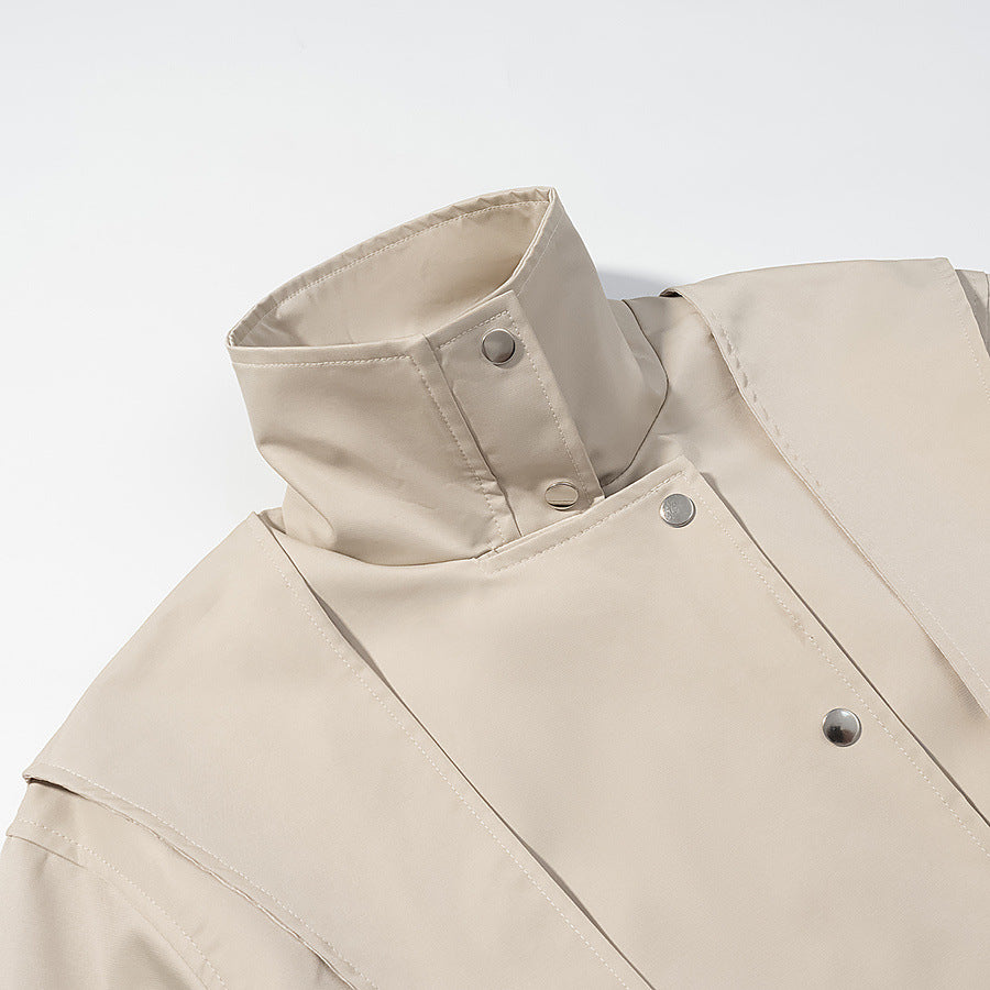 Women's short jacket with cape shoulder, stand-up collar and waist belt Chichicherry