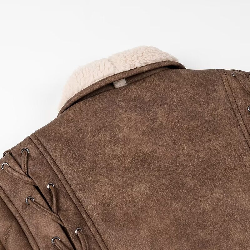 Ladies short jacket in aviator look with sherpa lining, tie belt and shoulder lacing Chichicherry