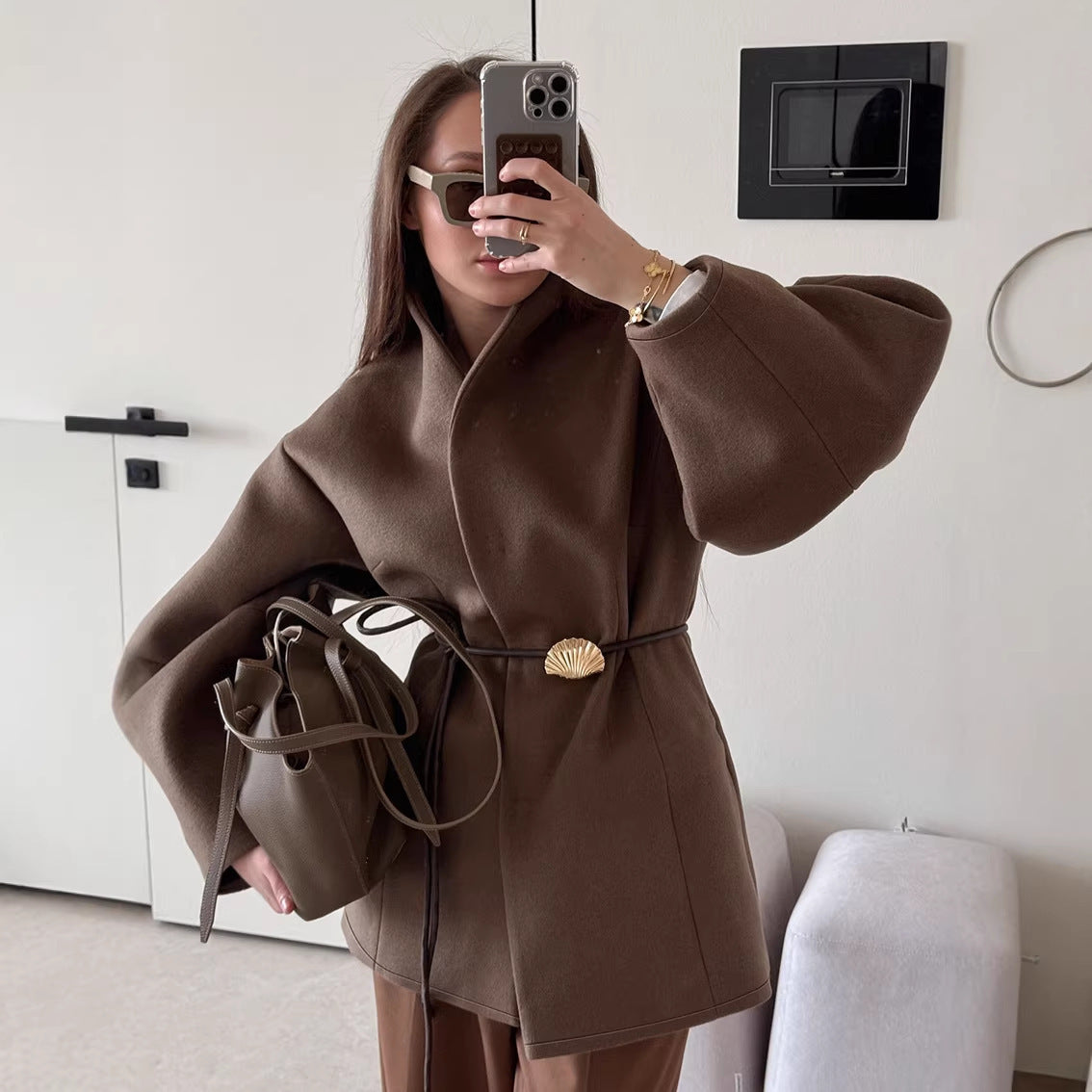 Women's short jacket with wrap closure, figure-hugging leather belt and shell clasp Chichicherry