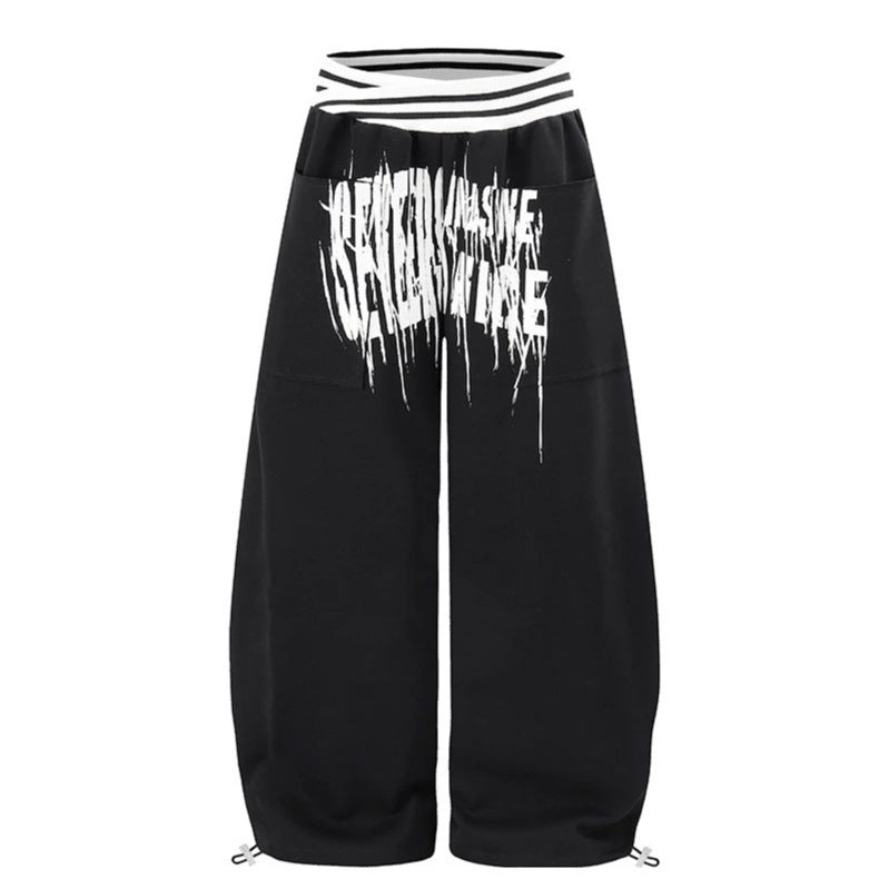 ladies culotte jogging pants with high-contrast waistband, patch pockets, and drawstring hem.