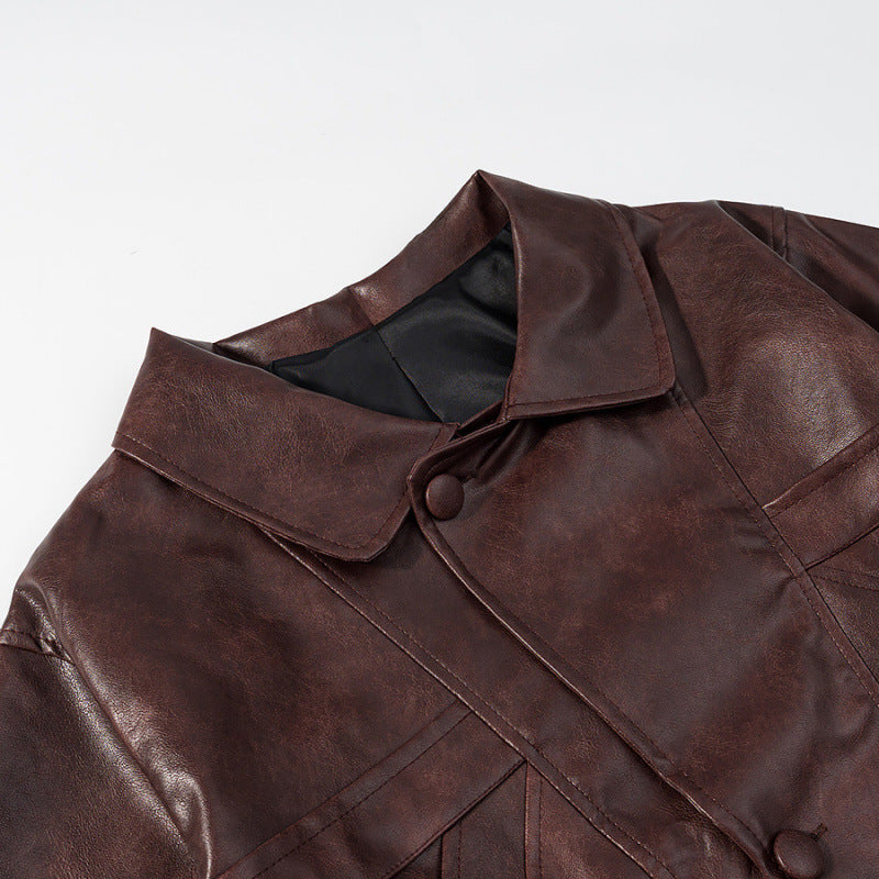Women's short jacket made of faux leather in boxy cut with decorative seam details Chichicherry