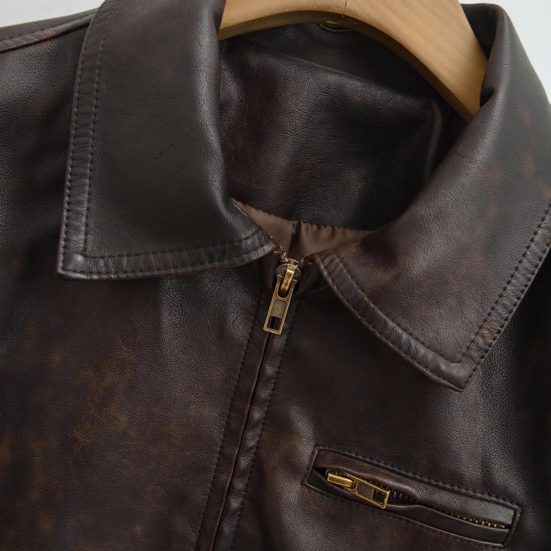 Men's vintage-inspired bomber style leather jacket with zipper and chest pocket Chichicherry