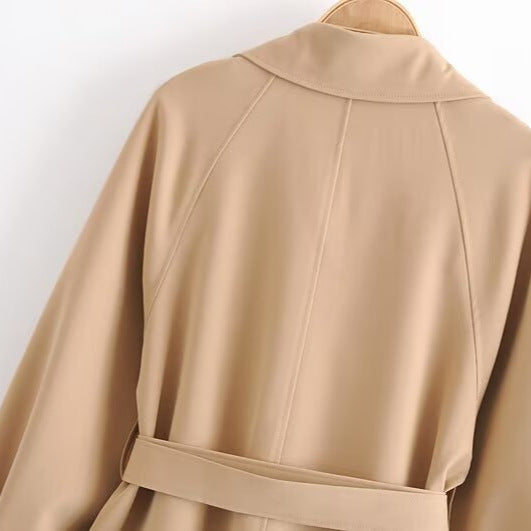 Women Short Tailored Trench Coat with Tied Belt, Asymmetrical Storm Flap and Cuff Strap Chichicherry