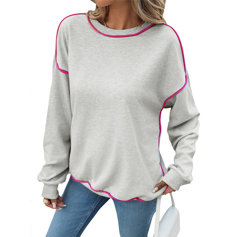 Women's oversized sweatshirt with contrast piping, dropped shoulder, and rounded hem Chichicherry