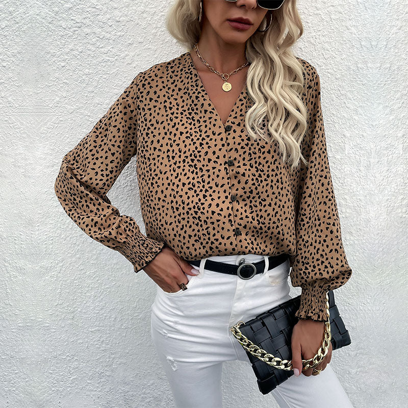 Women's lightweight blouse with V-neck, continuous button placket, and ruffled cuffs Chichicherry