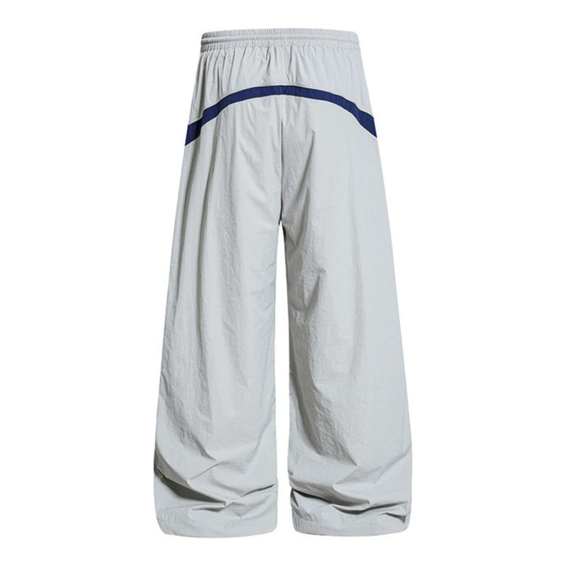Women Wide Nylon Palazzo Training Pants with Drawstring, Side Contrast Triangles and Adjustable Hem Chichicherry