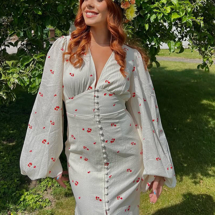 Ladies midi dress with puff sleeves, V-neckline and decorative button placket Chichicherry
