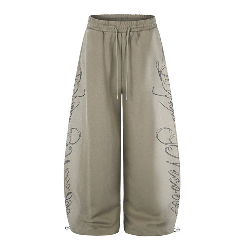 Women's Extra Wide Palazzo Sweatpants with Drawstring Waistband, Adjustable Hem, and Side Script Print Chichicherry