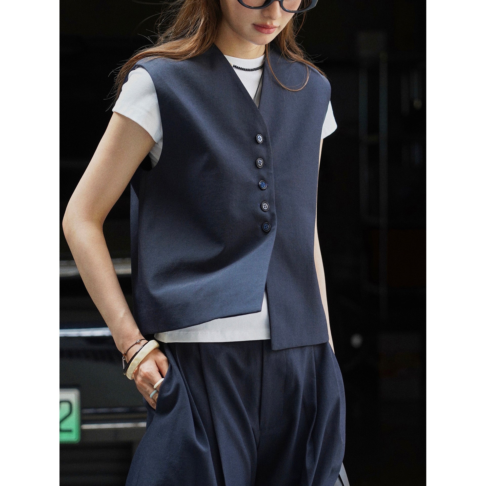 Women's Sleeveless Tailoring Vest with Deep V-Neck and Continuous Button Placket Chichicherry