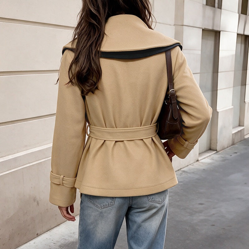 Women's short-cut wool blend coat with wide lapel collar, tie belt, and buckle cuffs Chichicherry