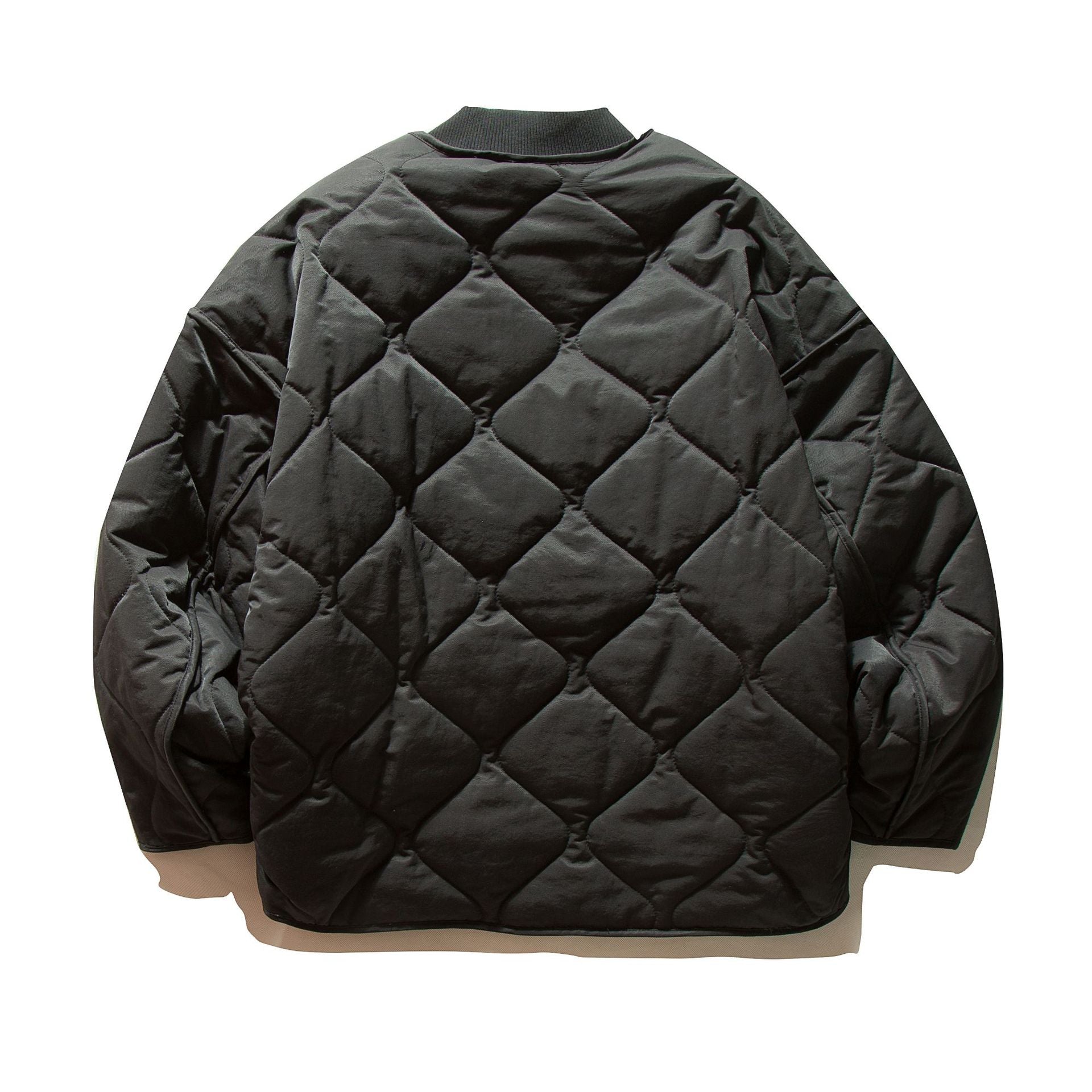 Unisex Short quilted bomber in boxy cut with ribbed collar and extra large flap pockets Chichicherry