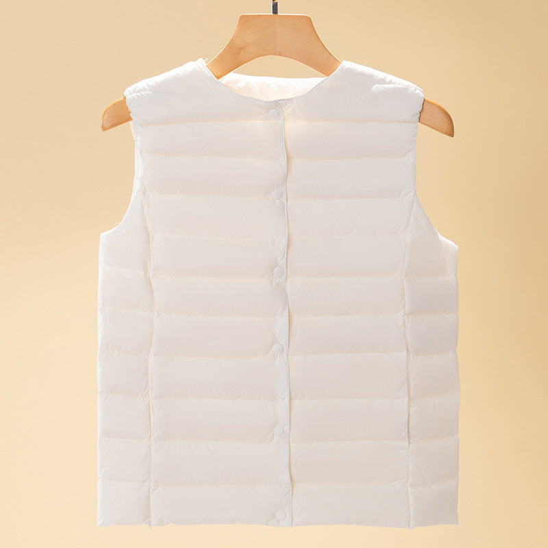 Women's sleeveless quilted thermal vest with round neck and snap button placket Chichicherry