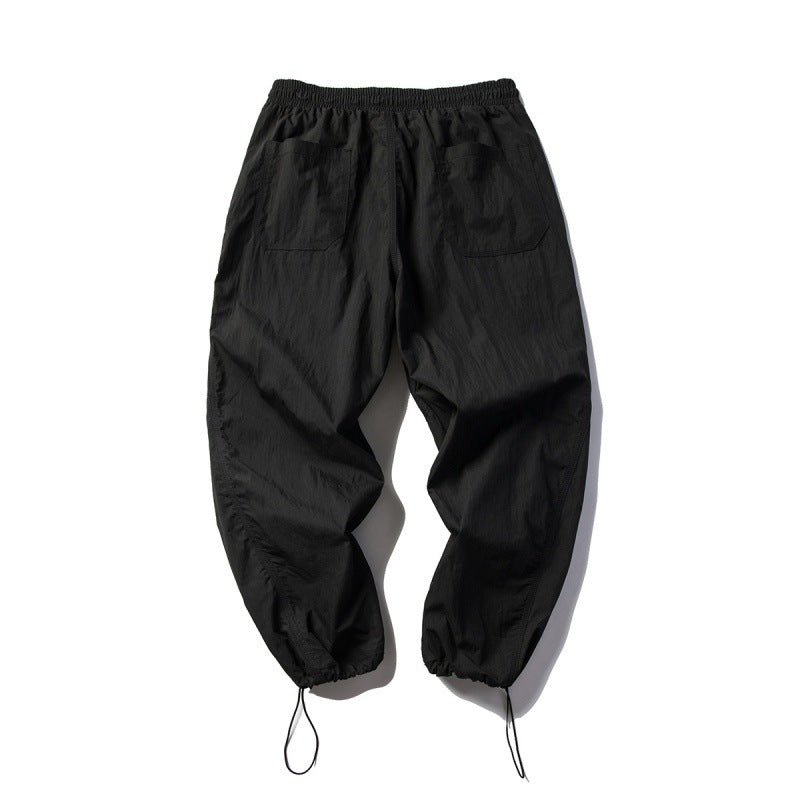Unisex Technical Cargo Pants in Baggy Cut with Drawstring Waist and Adjustable Leg Closures Chichicherry