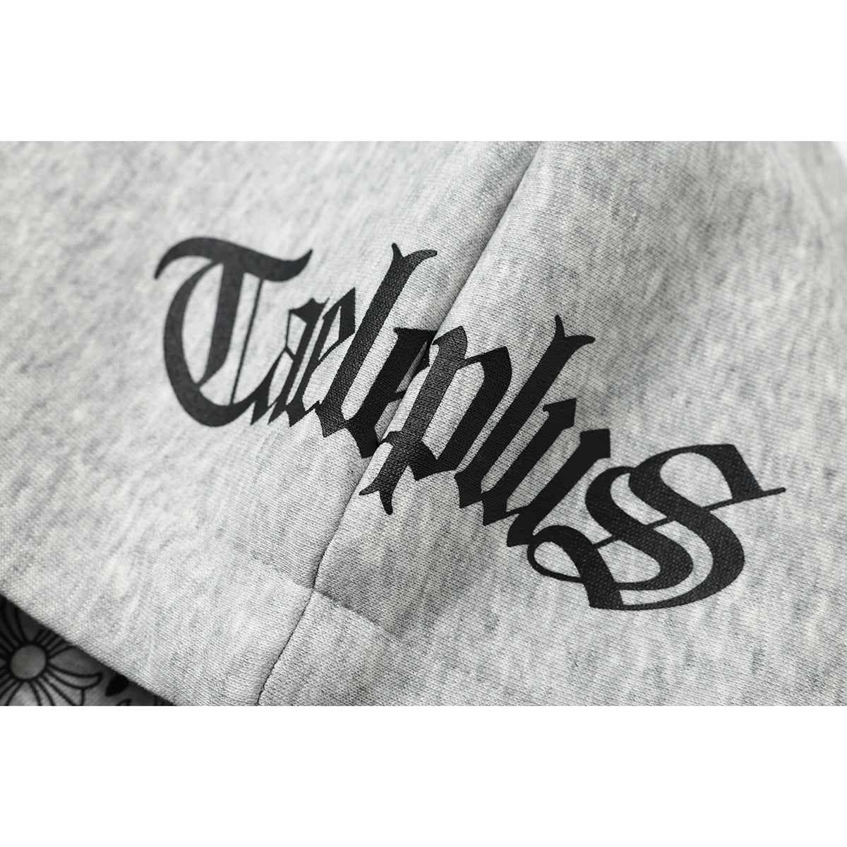 Unisex hooded sweatshirt in urban gothic print with ribbed hem Chichicherry