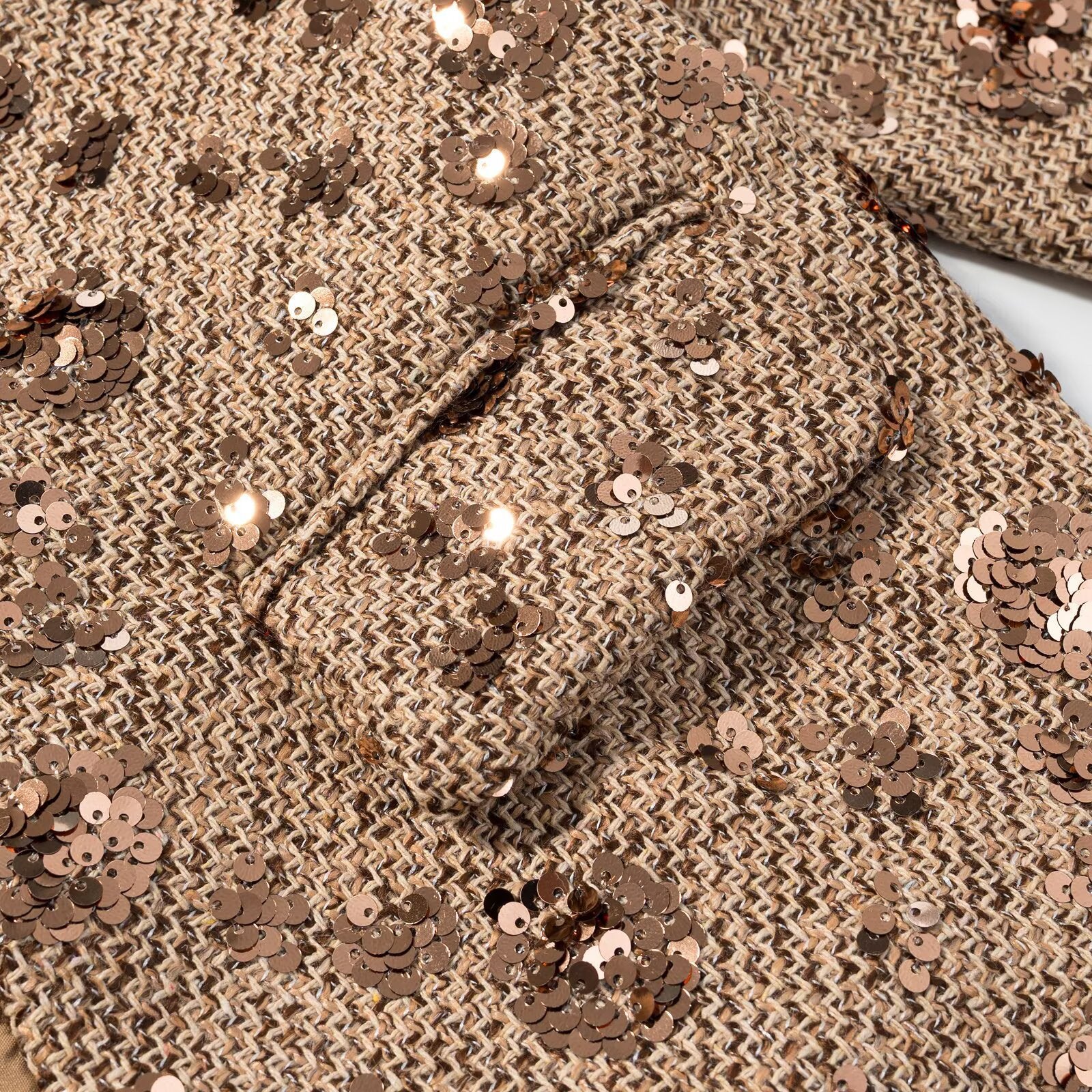 Women's short blazer made of tweed with sequin trim and bow closure Chichicherry