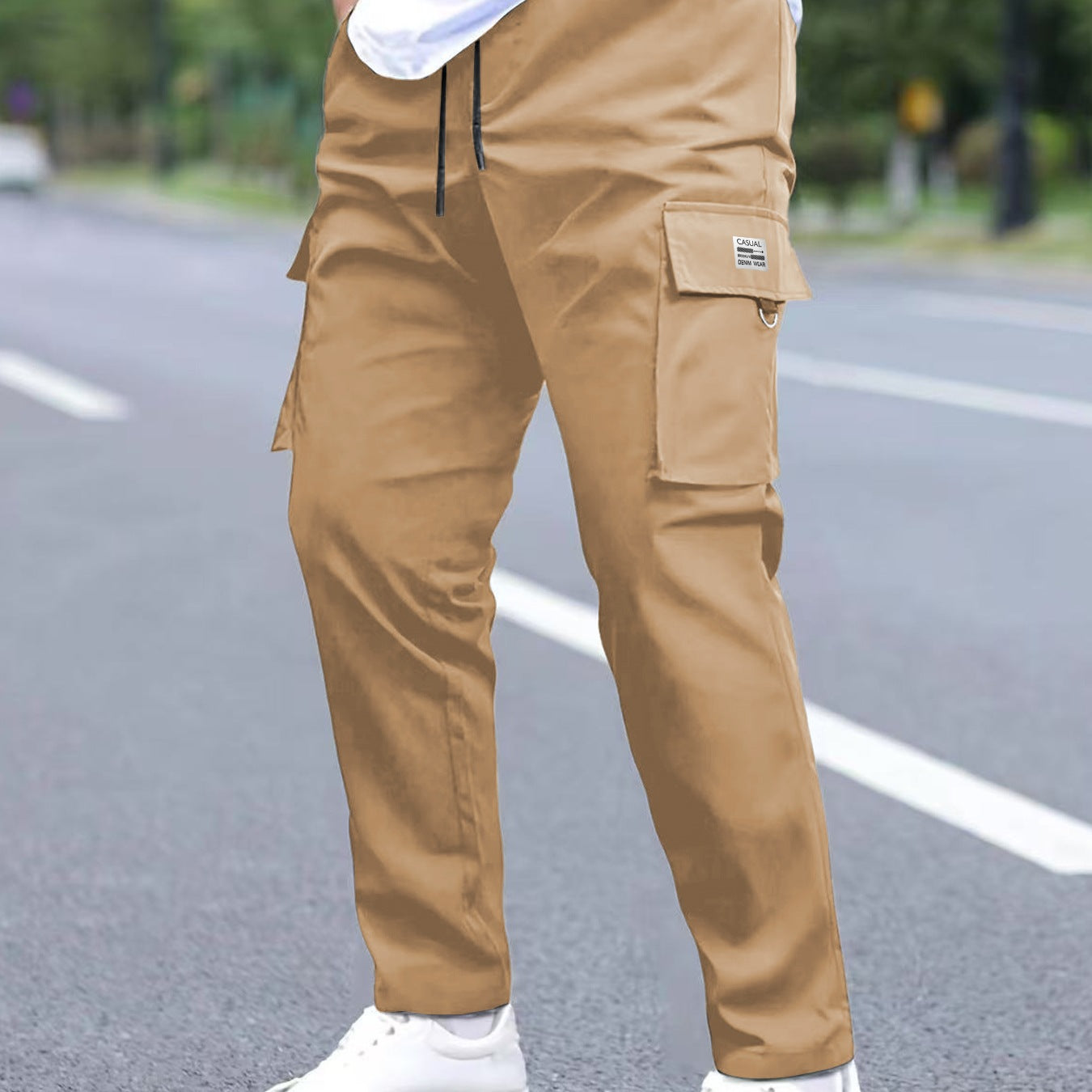 Men's utility cargo pants in a tapered cut with elastic drawstring waistband, large flap and zip pockets Chichicherry