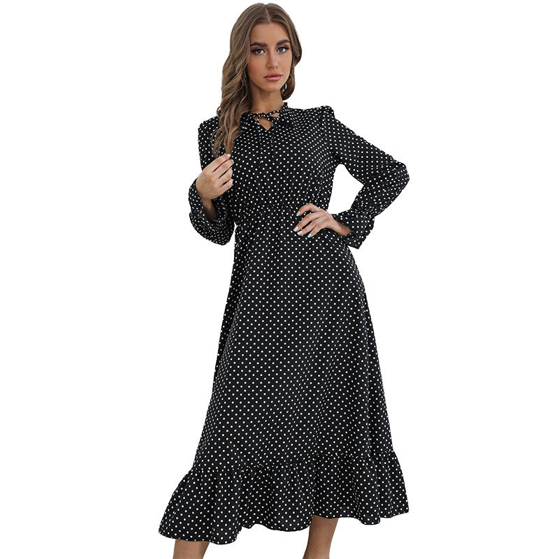 Women's maxi dress with polka dot print, gathered waist, bow collar and ruffled hem Chichicherry