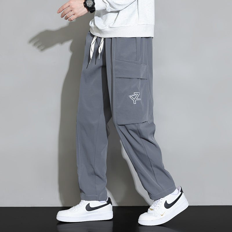 Men's loose-fitting cargo joggers with large flap pocket and drawstring Chichicherry