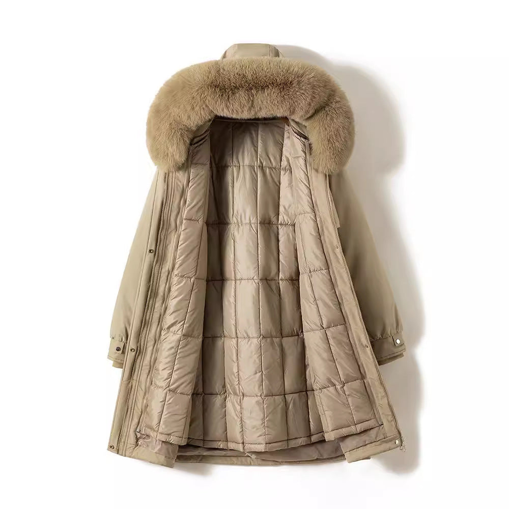 Women's longer water-repellent functional parka with removable faux fur hood and internal thermal padding Chichicherry