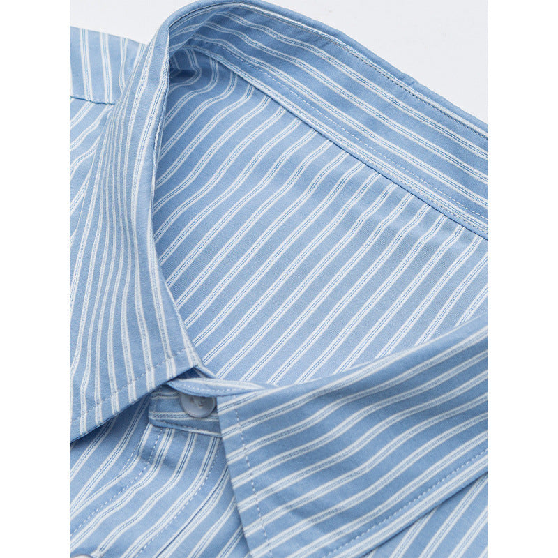 Women's oversized shirt with fine stripes, breast pocket, and rounded hem Chichicherry