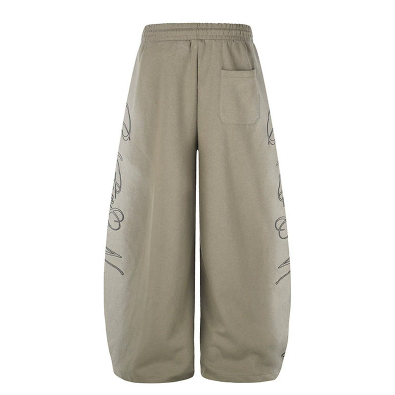 Women's Extra Wide Palazzo Sweatpants with Drawstring Waistband, Adjustable Hem, and Side Script Print Chichicherry