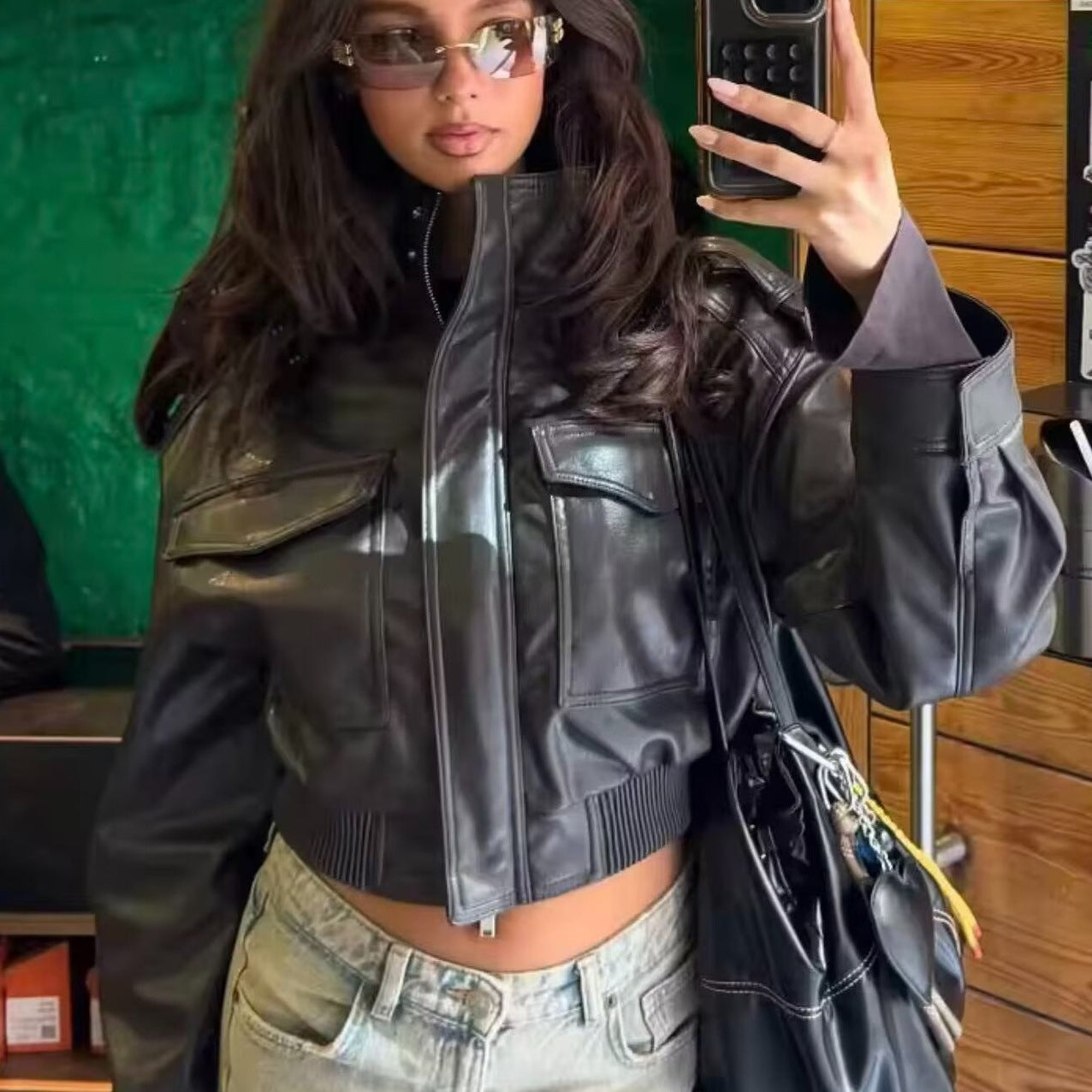 Women Short-Cut Leather Bomber with High Stand Collar, Shoulder Straps and Flap Pockets Chichicherry
