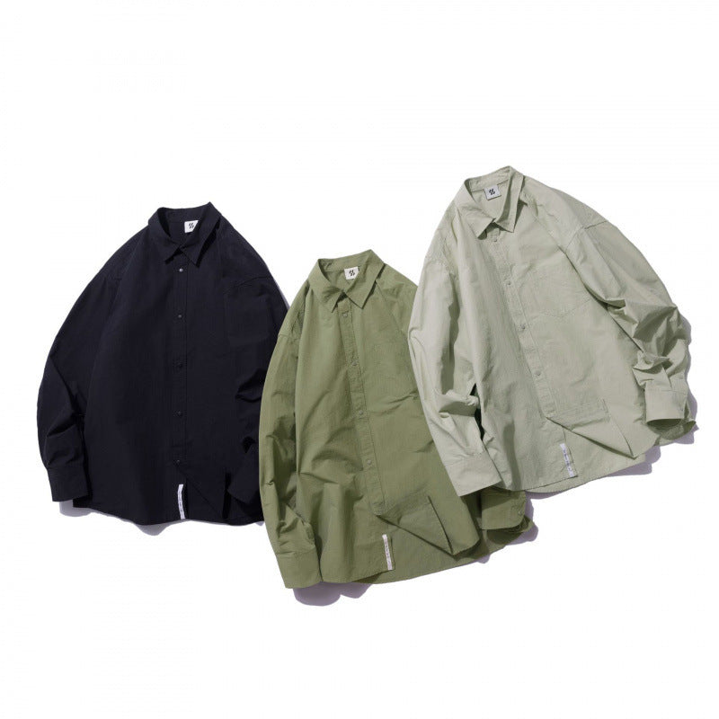 Unisex Oversize Shirt made of lightweight cotton blend with dropped shoulder and chest pocket Chichicherry