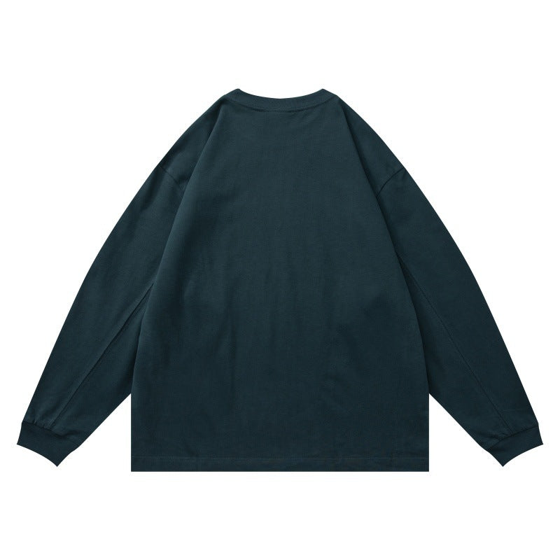 Unisex Oversize-Longsleeve shirt made of cotton blend with ribbed round neck and subtle chest application Chichicherry