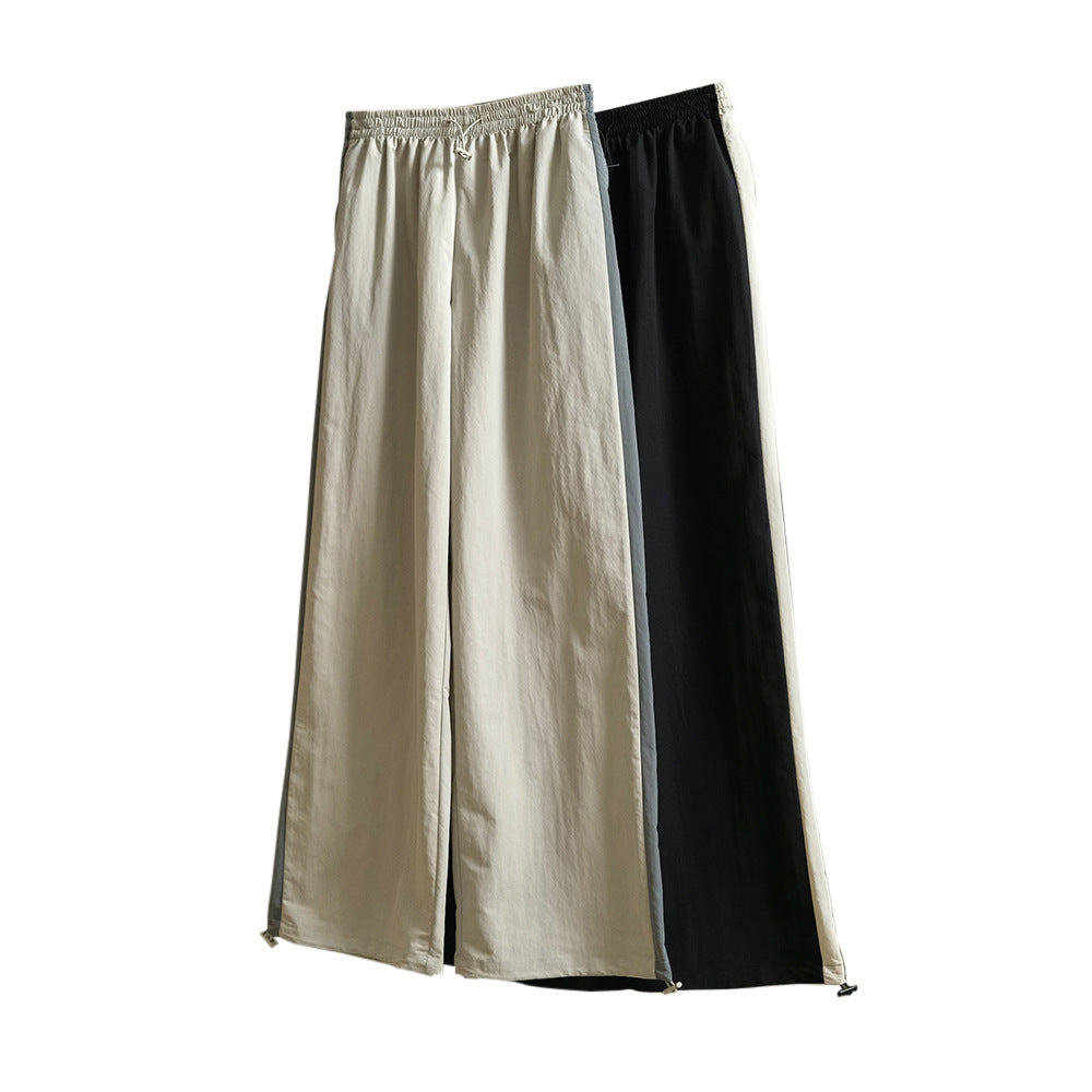 Women Wide High-Waist Track Pants in Palazzo Cut with Contrasting Side Stripe Chichicherry