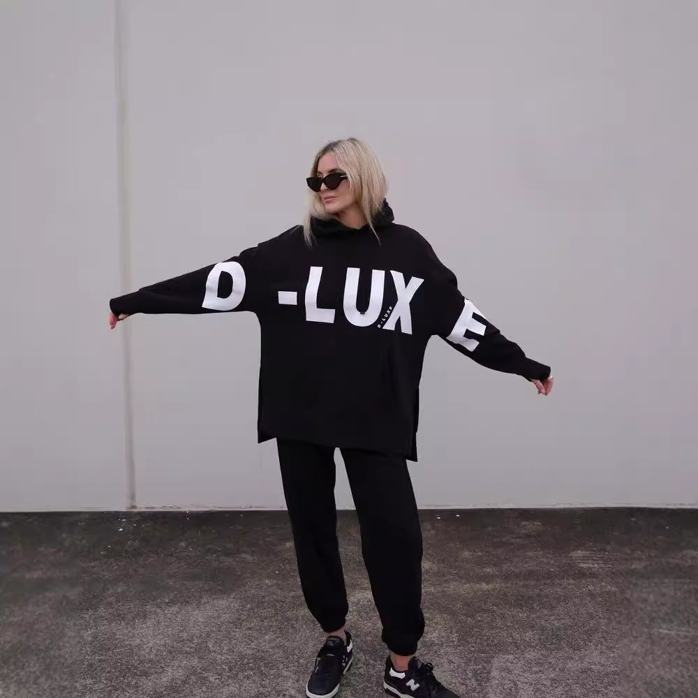 Damen Oversized Kapuzenpullover mit markantem Logoprint, Kängurutasche und Seitenschlitzen Chichicherry